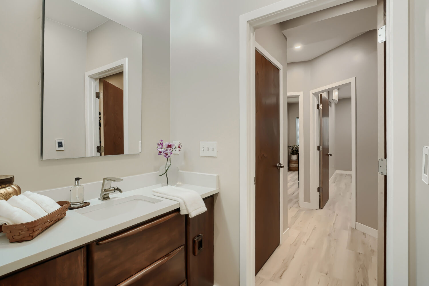 Basement bathroom and hallway — 3590 West 21st Avenue Unit 2, Denver, CO 80211
