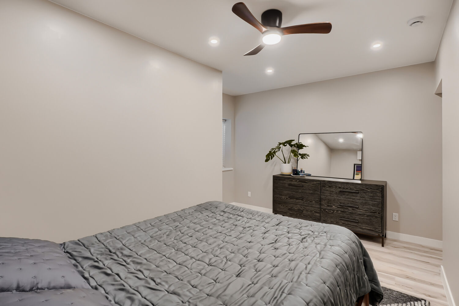 Basement bedroom, staged detail — 3590 West 21st Avenue Unit 2, Denver, CO 80211